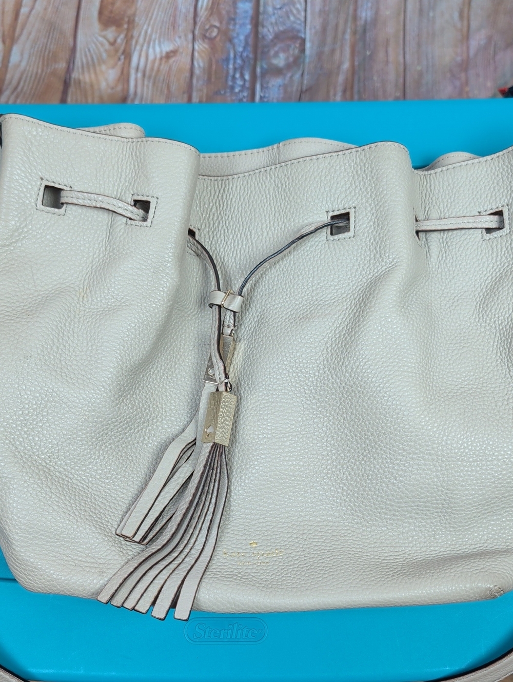 kate Spade Women's Cream Leather Tassel Drawstring Purse